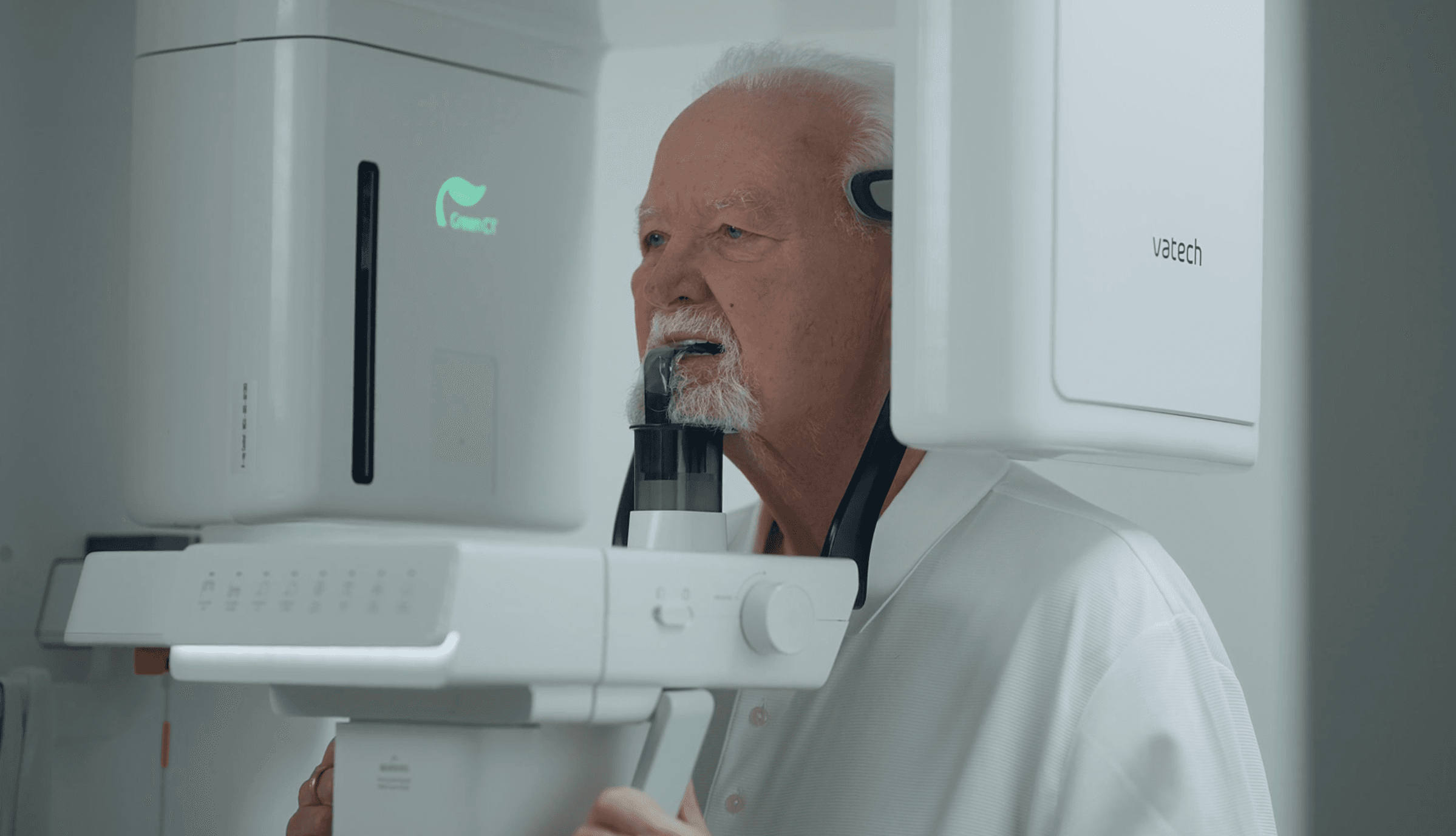 A patient positioned in the Vatech Green CT scanner at St. Pete Family & Cosmetic Dentistry.